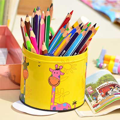 Children exploring art through painting and crafts at Jeanbean Preschool